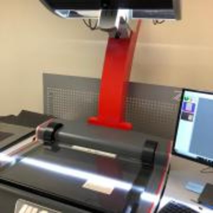 Photo showing scanner head in action.